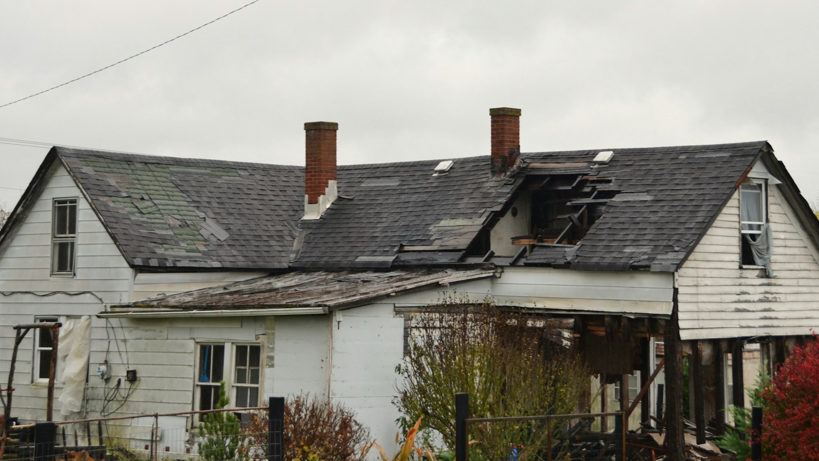 House with a storm-damaged roof